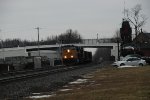 CSX 3018 takes a mixed train west.